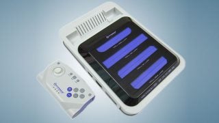 RetroN 5 console and controller on a blue background.