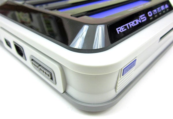 Close-up of the RetroN 5 gaming console with display.