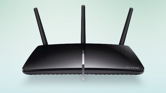 TP-Link Archer D7 wireless router on a light background.