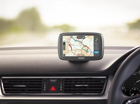 TomTom GO 40TomTom GO 40 GPS navigation system on a car dashboard.