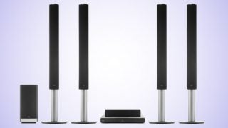LG BH9540TW home theater system with four tall speakers.