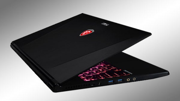 MSI GS60 2PE Ghost Pro laptop with backlit keyboard.
