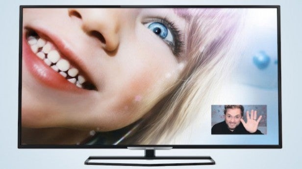 Large TV displaying a vivid close-up image with a webcam window.
