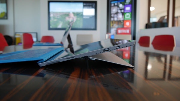 Surface Pro 3 with keyboard on a conference table.
