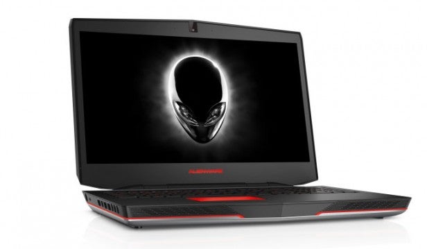 Gaming laptop with illuminated logo on screen and red accents.