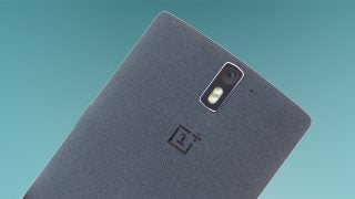 Close-up of OnePlus One smartphone back with camera and logo.