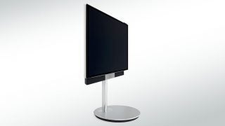 Bang & Olufsen BeoVision Avant TV on a stand.