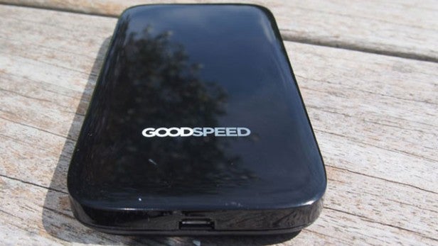 Uros Goodspeed mobile hotspot device on wooden surface.