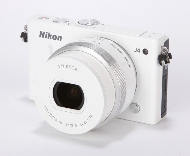 Nikon J4 mirrorless camera with 10-30mm lens.
