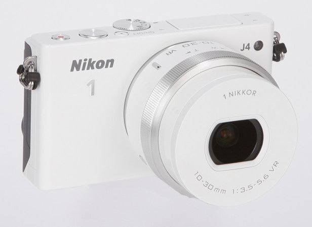 White Nikon 1 J4 camera with 10-30mm lens