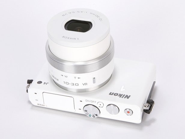 White Nikon 1 J4 camera with 10-30mm lens.