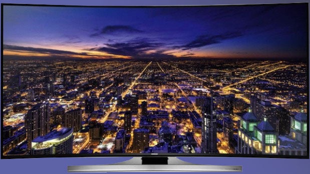 Samsung UE55HU8200 TV displaying cityscape at night.