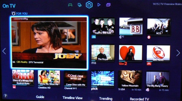 High-resolution smart TV interface displaying various channels and programs.