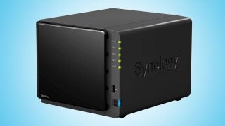 Synology DiskStation DS415play NAS device on blue background.