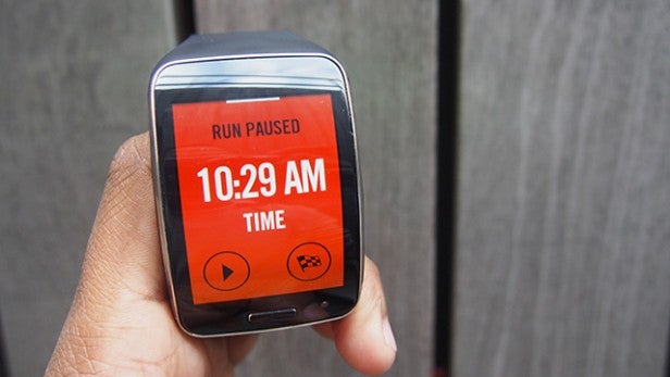 Samsung Gear S smartwatch showing paused run screen.