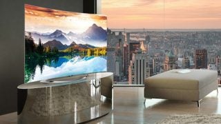 LG 65EC970V OLED TV in modern living room with city view.