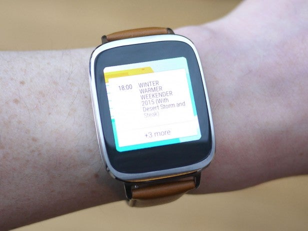Asus ZenWatch on wrist displaying calendar notification.