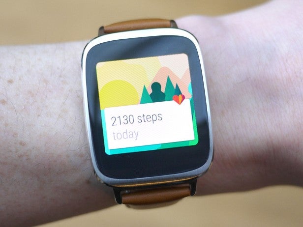 Smartwatch on wrist displaying step count for the day