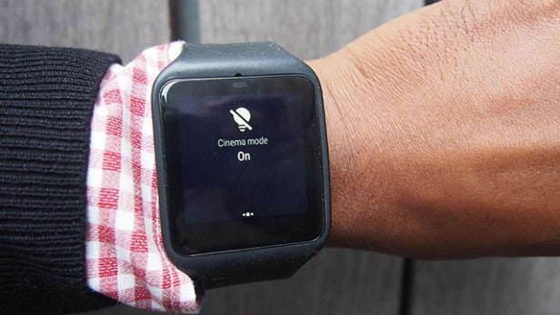 Smartwatch displaying cinema mode feature on its screen.