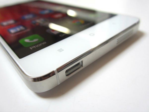 Close-up of Xiaomi Mi4 smartphone showing the charging port.