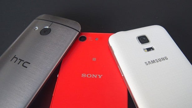 Three smartphones from HTC, Sony, and Samsung side by side.