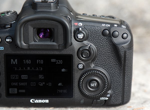 Close-up of Canon EOS 7D Mark II camera controls and LCD.