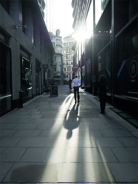 High-contrast city street photo highlighting camera dynamic range.