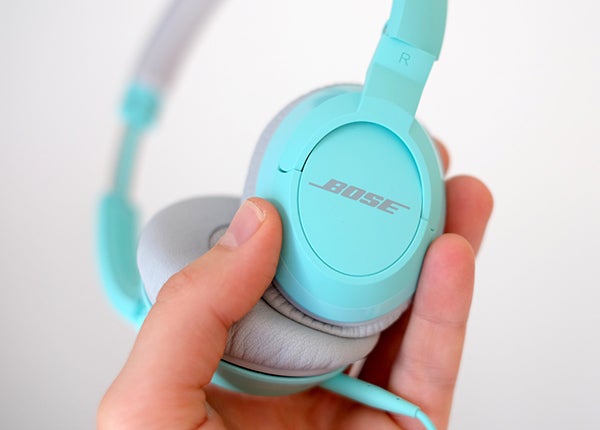 Close-up of Bose SoundTrue On-Ear headphones in teal color