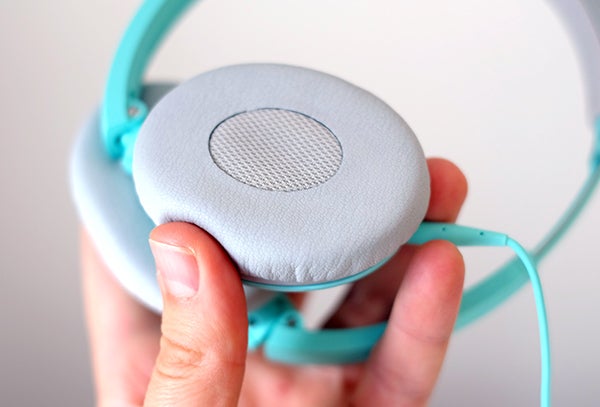 Close-up of Bose SoundTrue On-ear headphones in hand.