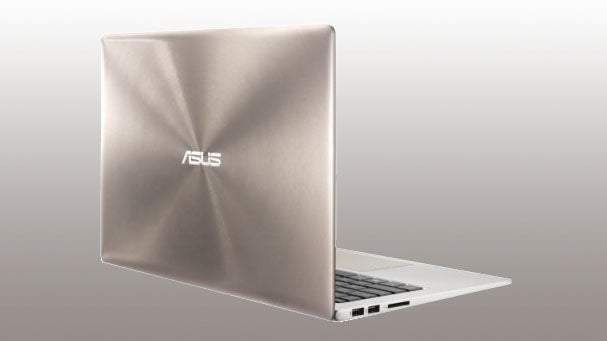 Asus Zenbook UX303LA laptop with open lid and visible logo.