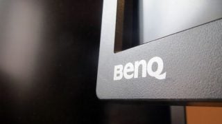 Close-up of the BenQ logo on a monitor bezel.