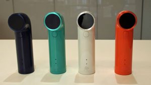 HTC RE cameras in different colors displayed on table.