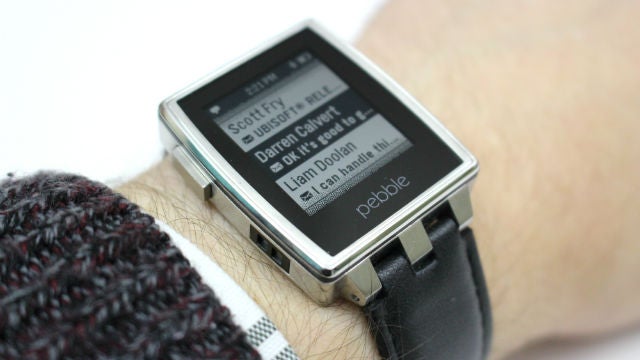 Pebble Steel smartwatch on wrist displaying notifications.