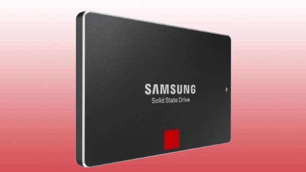 Samsung 850 Pro 512GB solid state drive against red background.