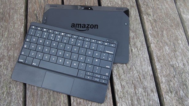 Amazon tablet keyboard on a wooden surface.