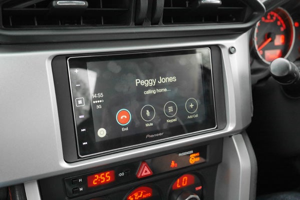 Apple CarPlay interface on a Pioneer dashboard displaying incoming call.