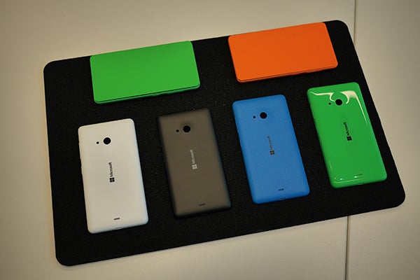 Microsoft Lumia 535 phones and colorful back covers.