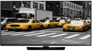 Samsung UE40H5500 TV displaying colorful taxi scene.