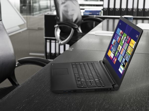 Toshiba Satellite Pro R50-B-12U laptop on an office desk.