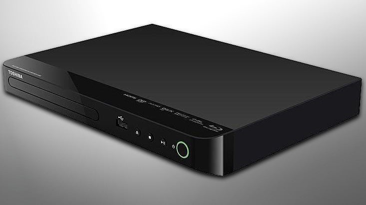 Toshiba BDX2550 Blu-ray player on a dark background.