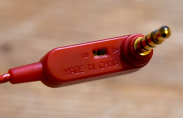 Close-up of SoundMagic E10S earphones' 3.5mm jack and inline remote.