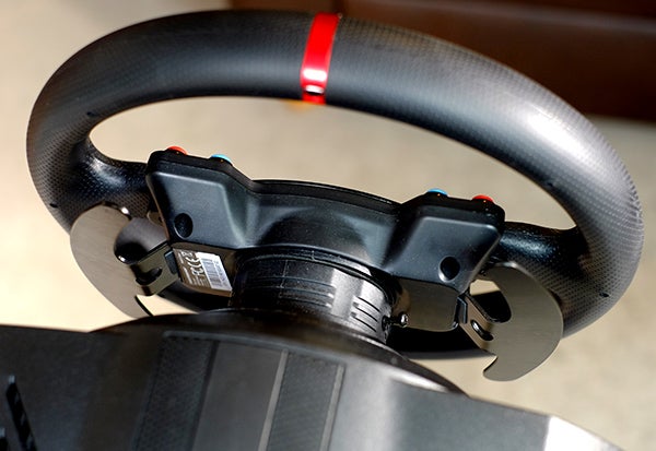 Close-up of Thrustmaster T300 GTE steering wheel.