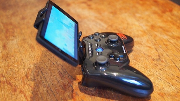 Mad Catz C.T.R.L.R mobile gaming controller with attached smartphone.