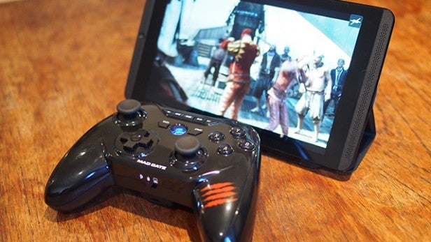 Mad Catz C.T.R.L.R. controller in front of tablet displaying a game.