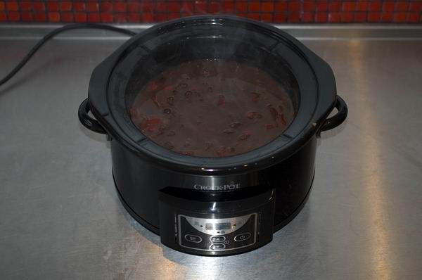 Crock-Pot Countdown Slow Cooker with food inside on kitchen counter.