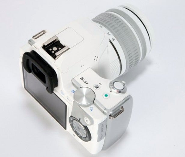 Digital camera with viewfinder and autofocus lens