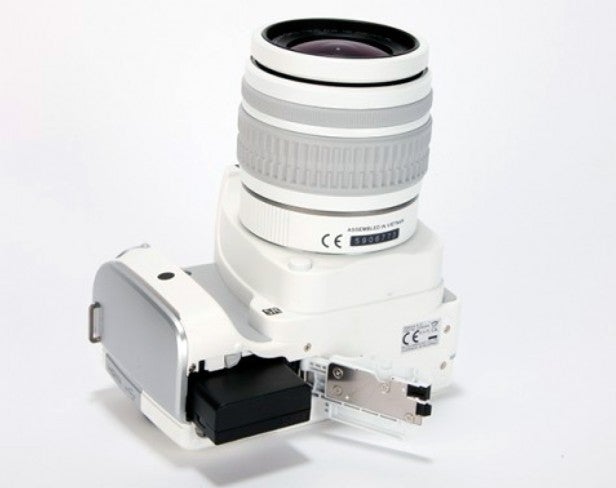 Camera with telephoto lens and detached viewfinder