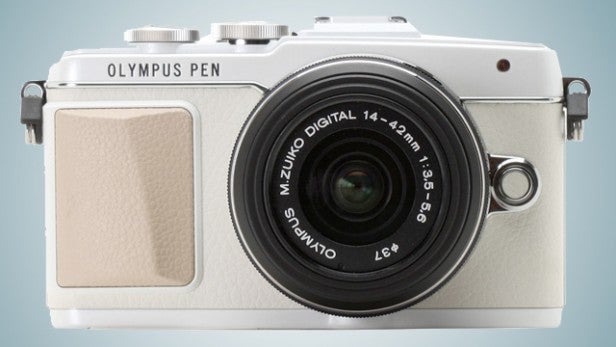 Olympus PEN camera with 14-42mm lens on a blue background.