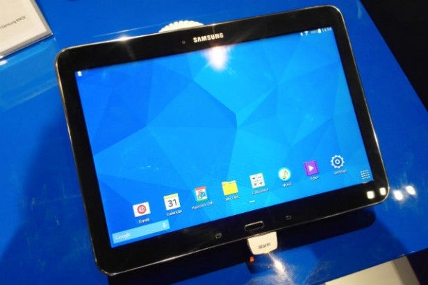 Samsung Galaxy Tab 4 Education on display with apps on screen.Samsung Galaxy Tab 4 Education displayed on a blue background.