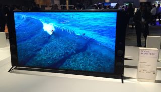 Sony KD-75X9405C television displaying ocean imagery at an exhibit.